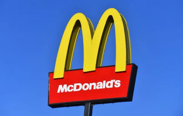 McDonald’s logo is seen outside one of its stores in Stoke-on-Trent, England