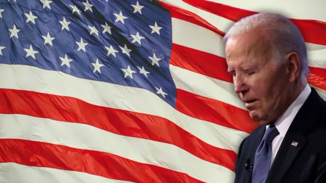 President Joe Biden in front of an American flag