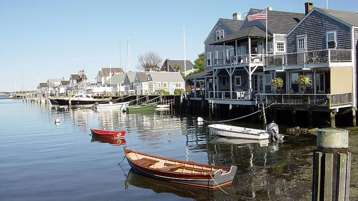 A view of large vacation homes set against the water