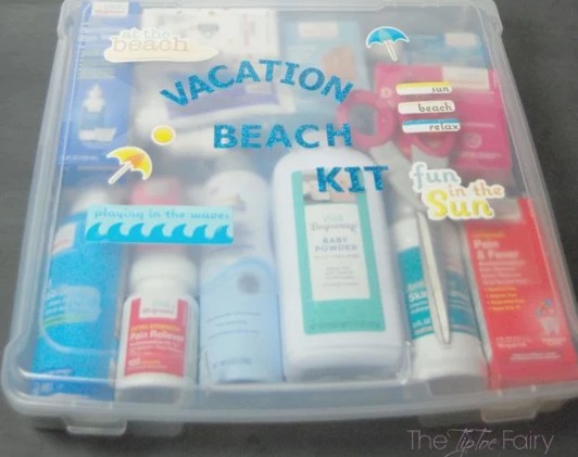 Clear container holding a collection of beach supplies.