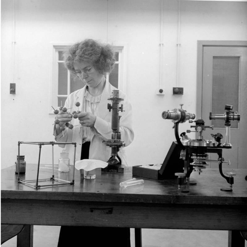 A researcher working with laboratory equipment