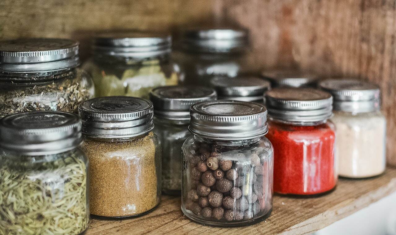 Jars of dried herbs and spices