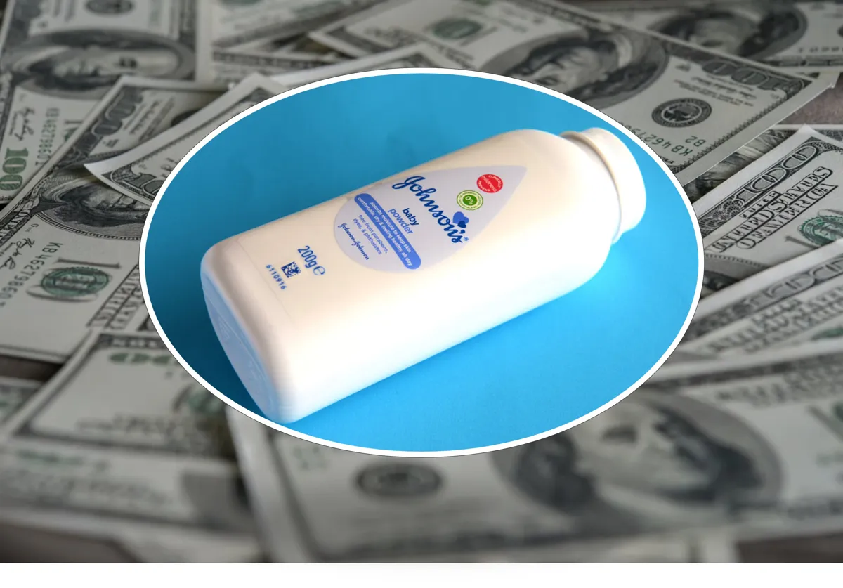 J&J Baby Powder against a background of $100 bills