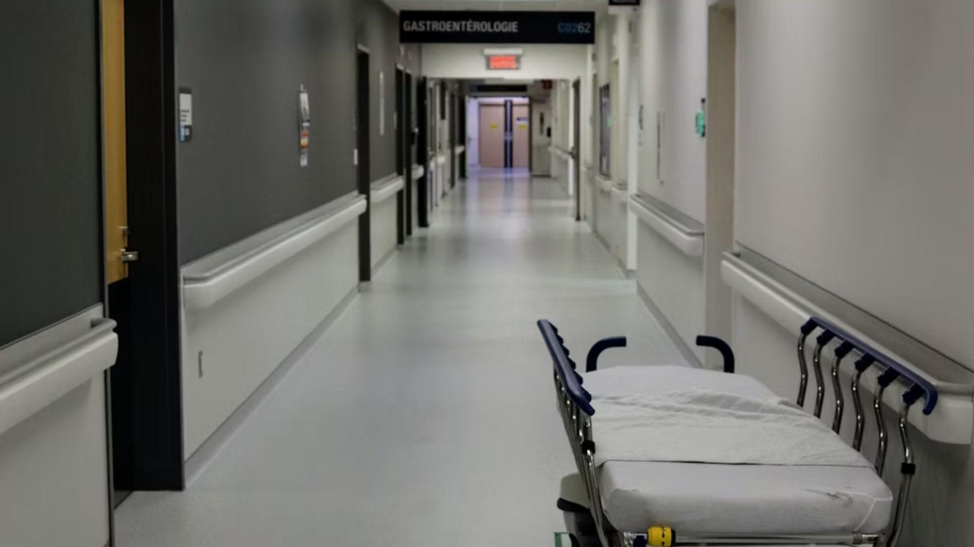 A hospital corridor and bed; illustrative archive photograph.