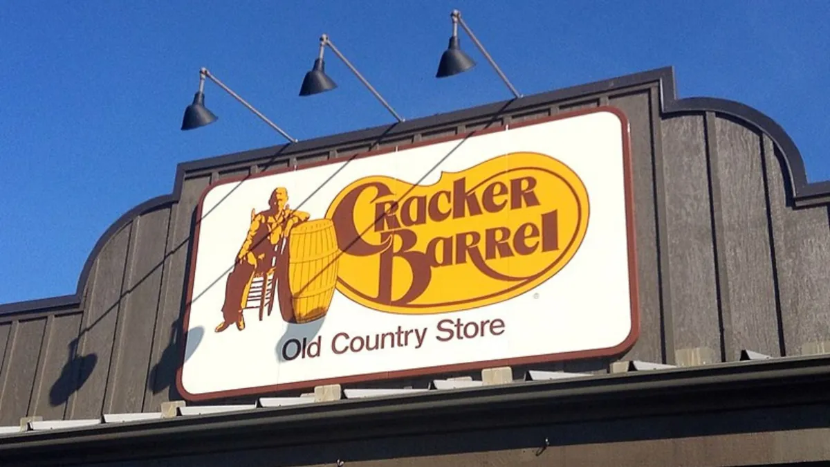 A close up of a large Cracker Barrel sign