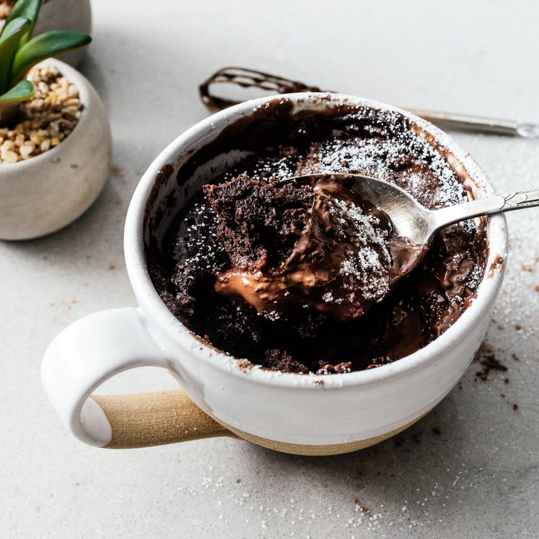 A cake in a mug; illustrative archive photograph, cooking completeness not verified.