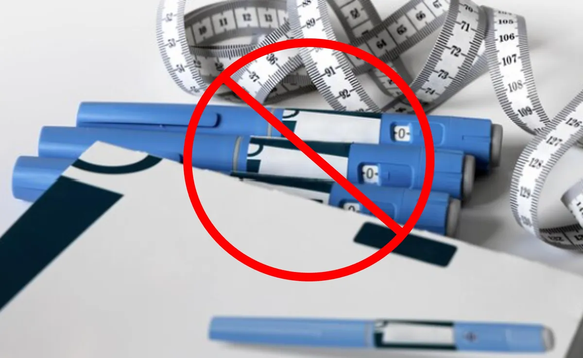 Counterfeit Ozempic pens next to a measuring tape and notepad with a stop sign over it
