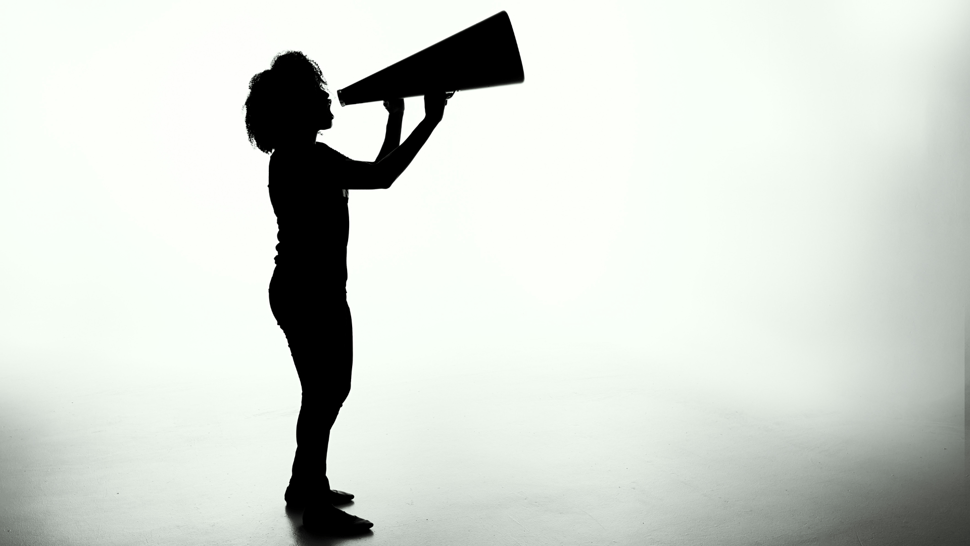 A silhouette with a megaphone; illustrative archive image.