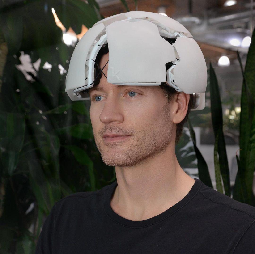 Bryan Johnson wearing a head-mounted measurement device
