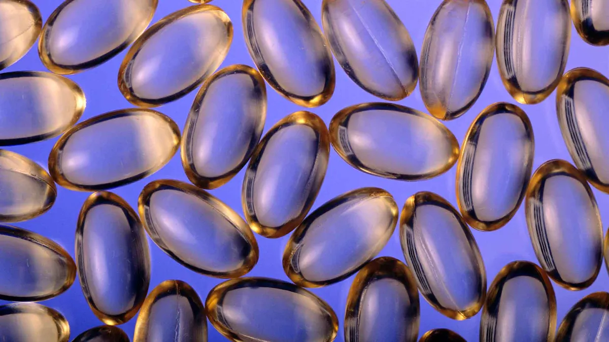 multivitamins against purple background