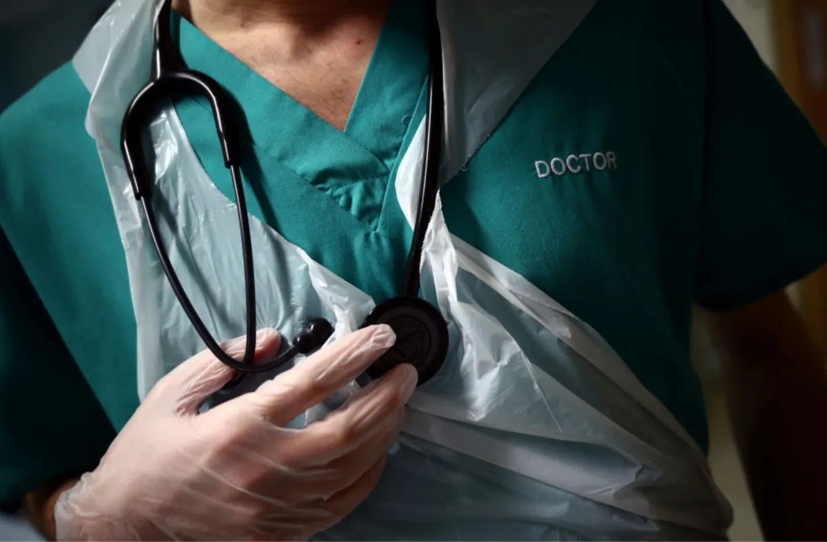Closeup shot of a doctor at work in scrubs