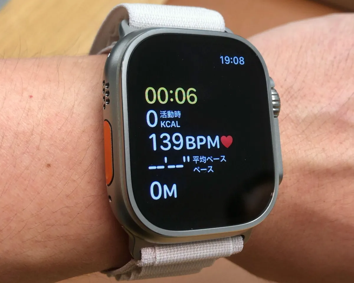 A person is pictured wearing an Apple Smartwatch