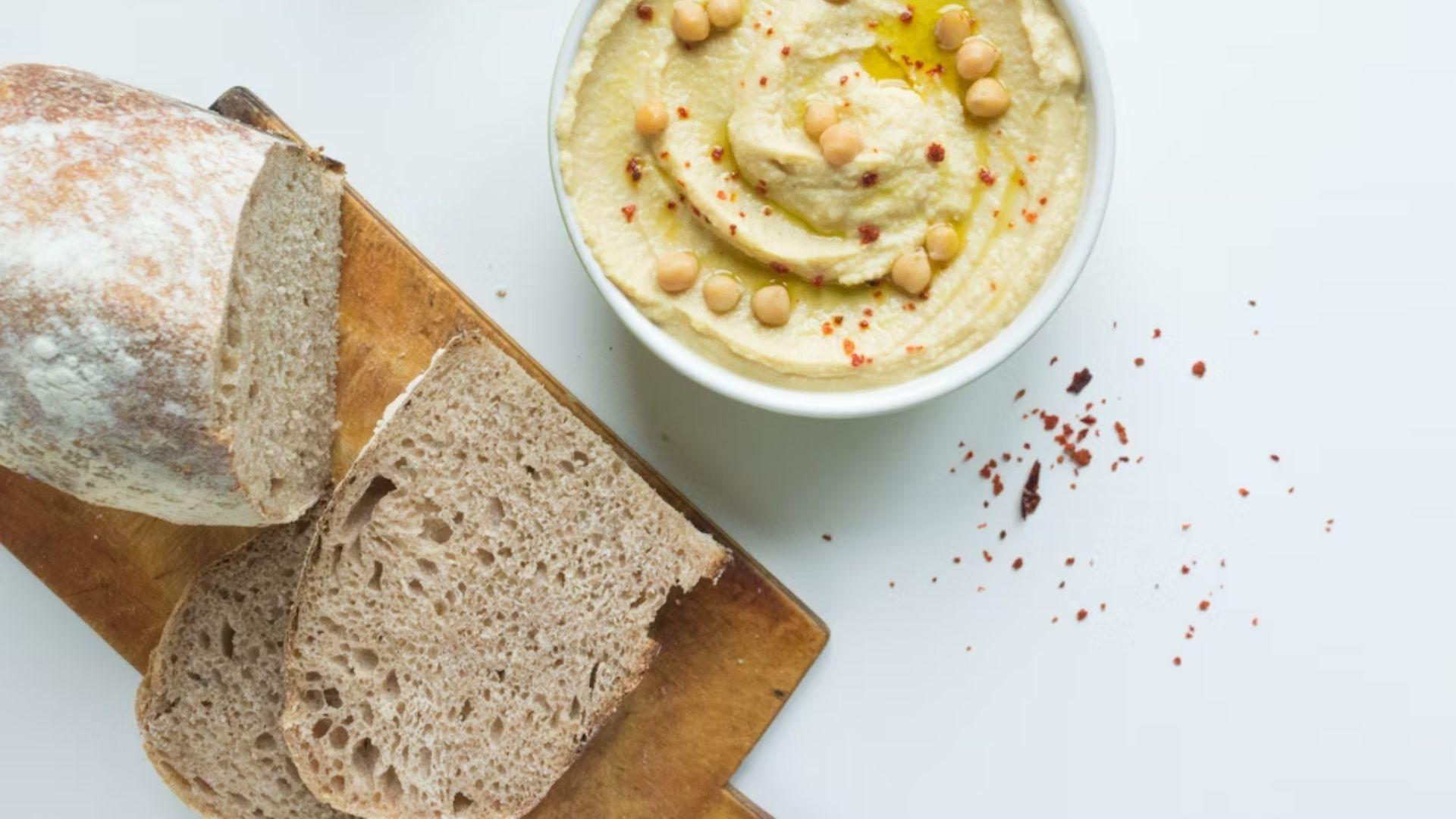 Bread and a bowl of spread; illustrative archive photograph.