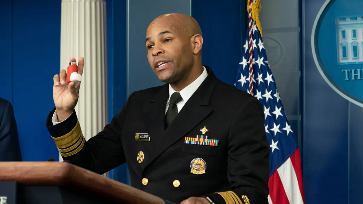 Jerome Adams at a White House podium talking.
