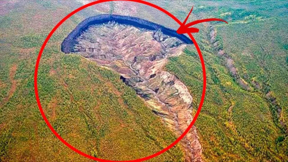 An aerial photograph of the giant Batagay megaslump in Russia