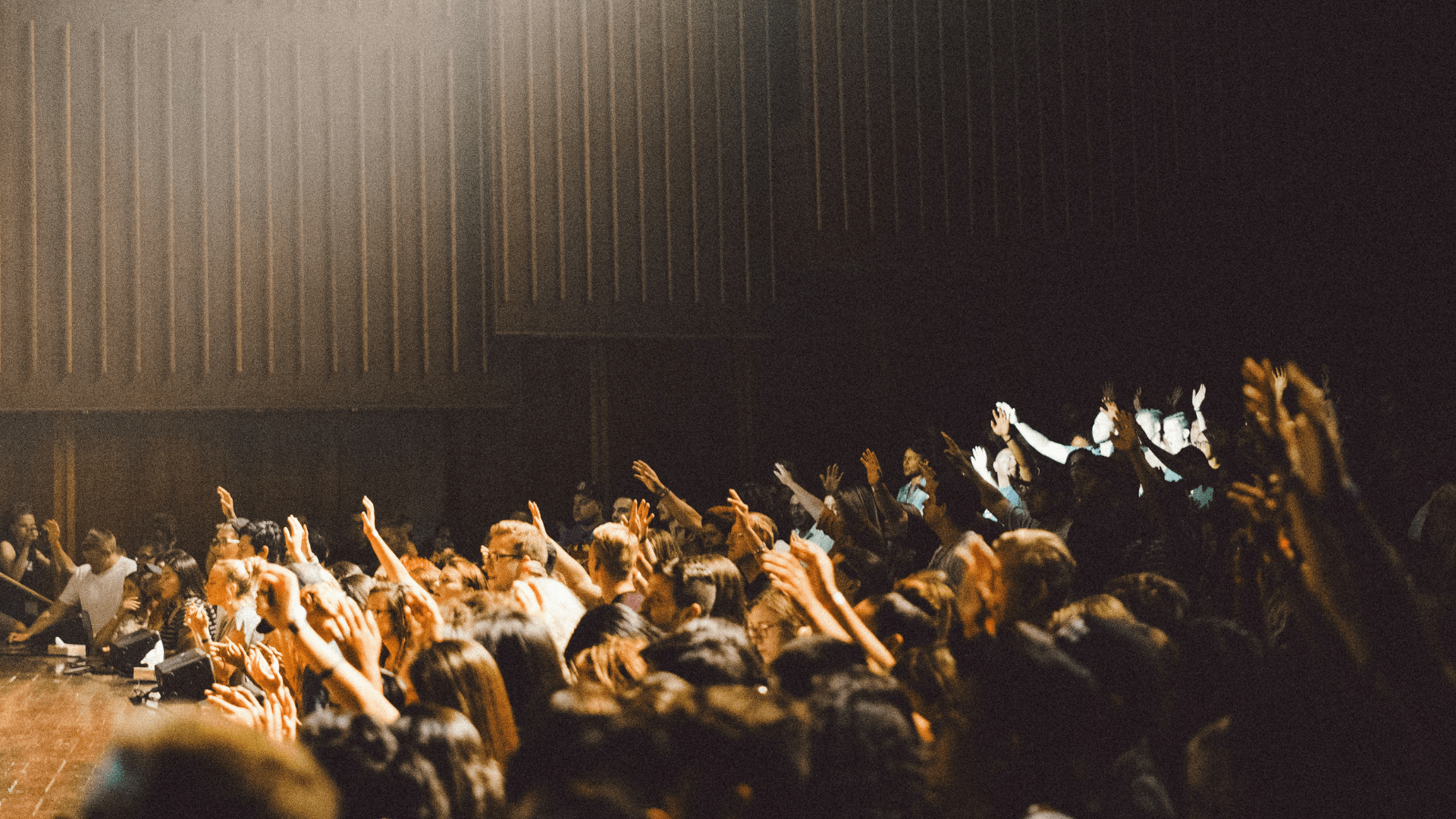 An audience in a room; illustrative archive photograph.
