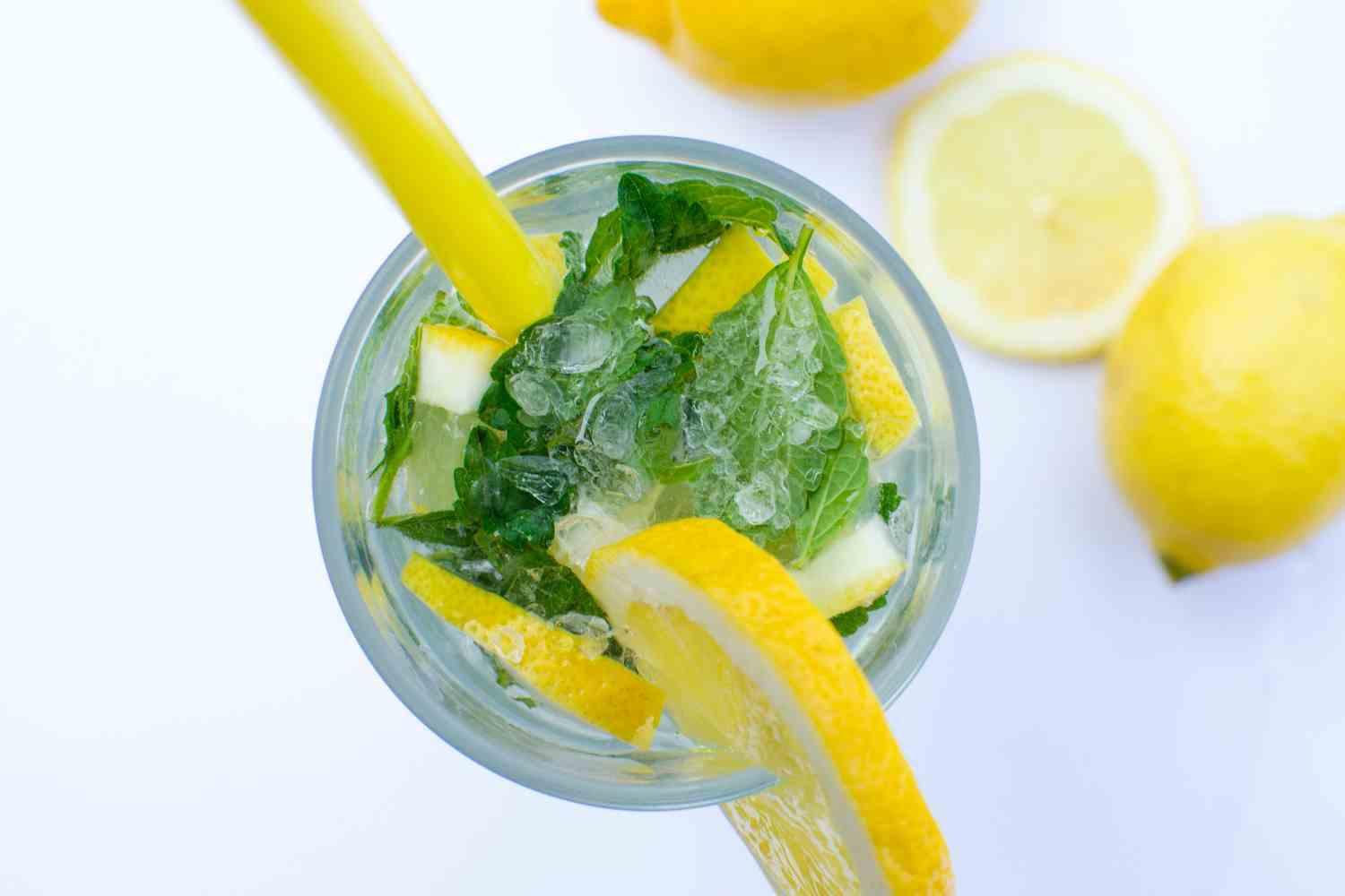 A lemon drink with ice and herbs in an archive photograph.
