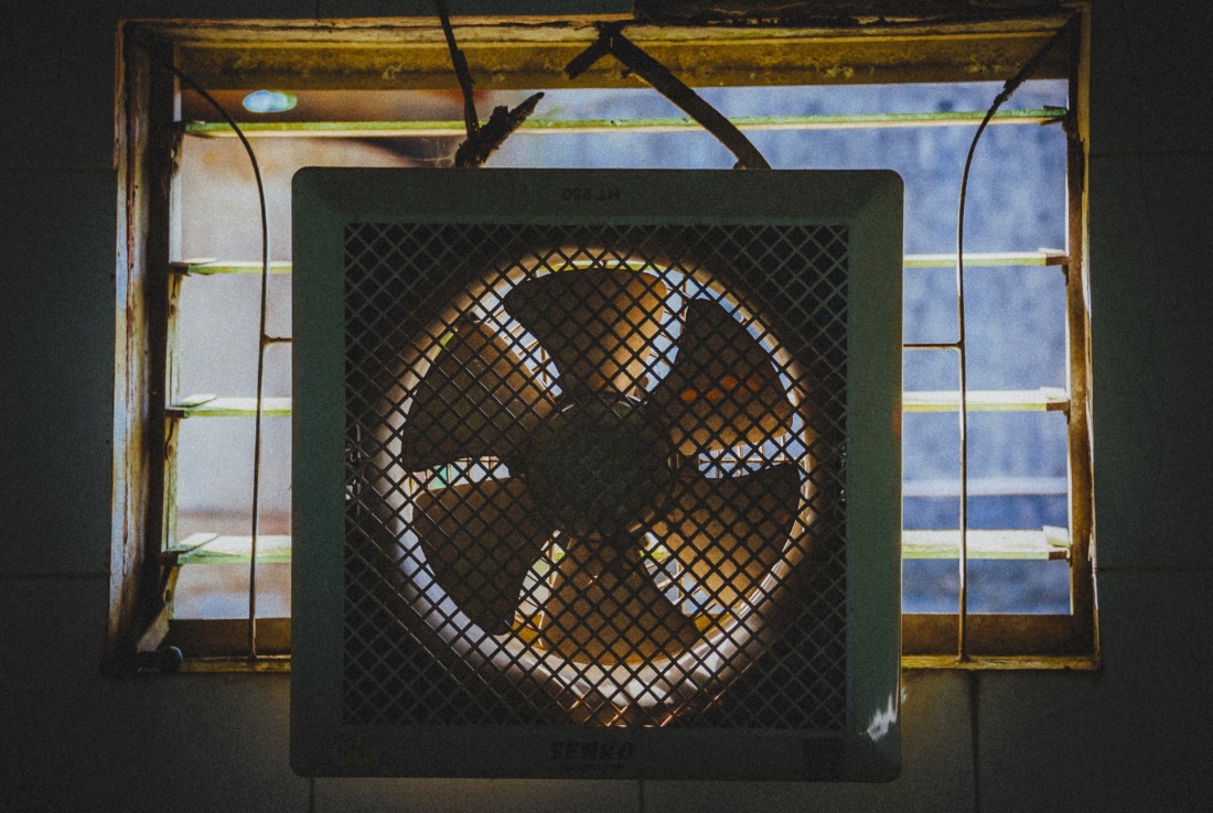 Ventilation fan installed in an opening