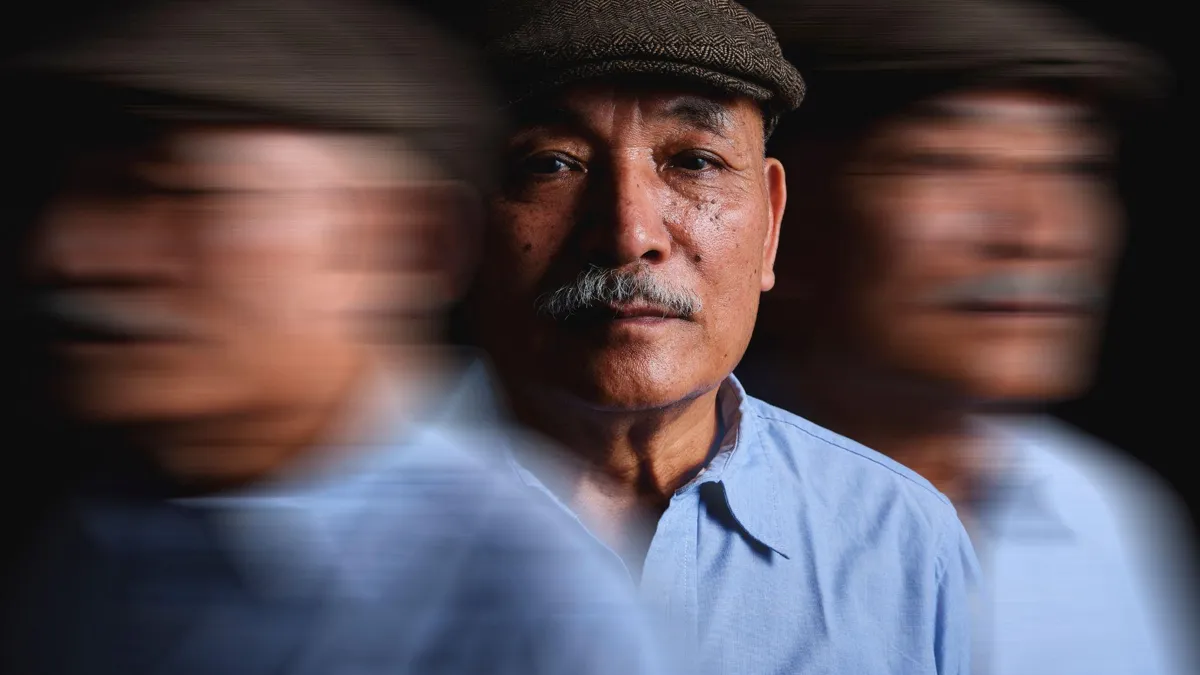 A man is shown still-shot, posing next to stop-motion shots of himself to the left and to the right.