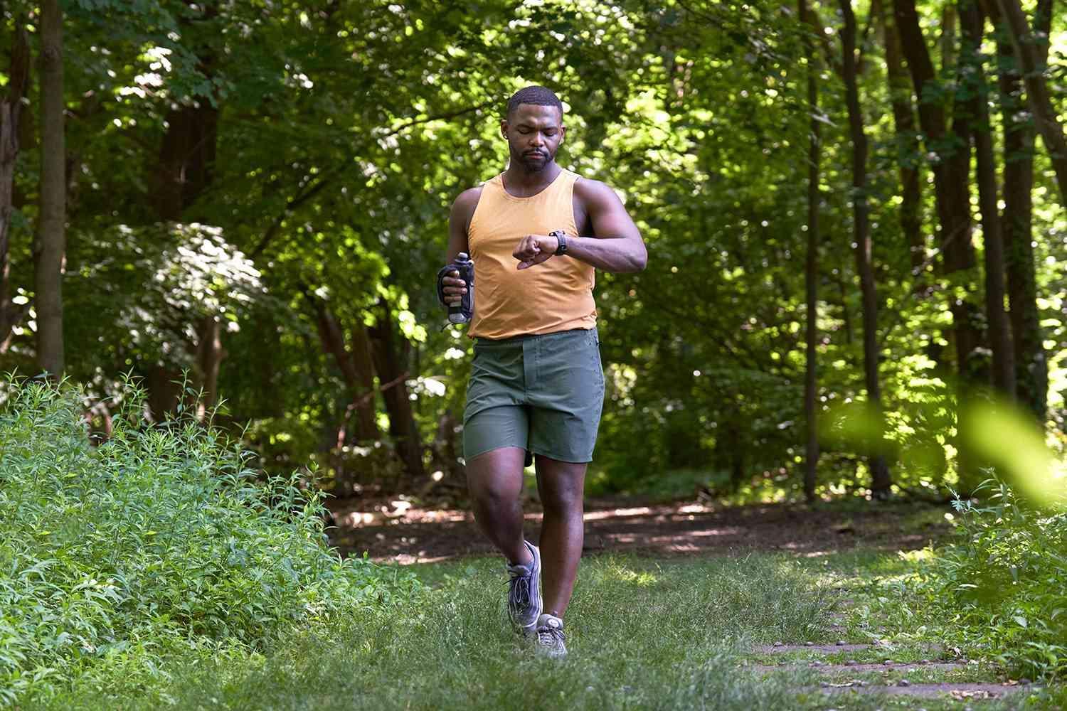 A person running in woodland; illustrative archive photograph.