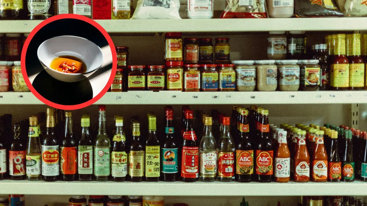 Chili sauce in a white bowl; a variety of different sauces on the shelves at a grocery store