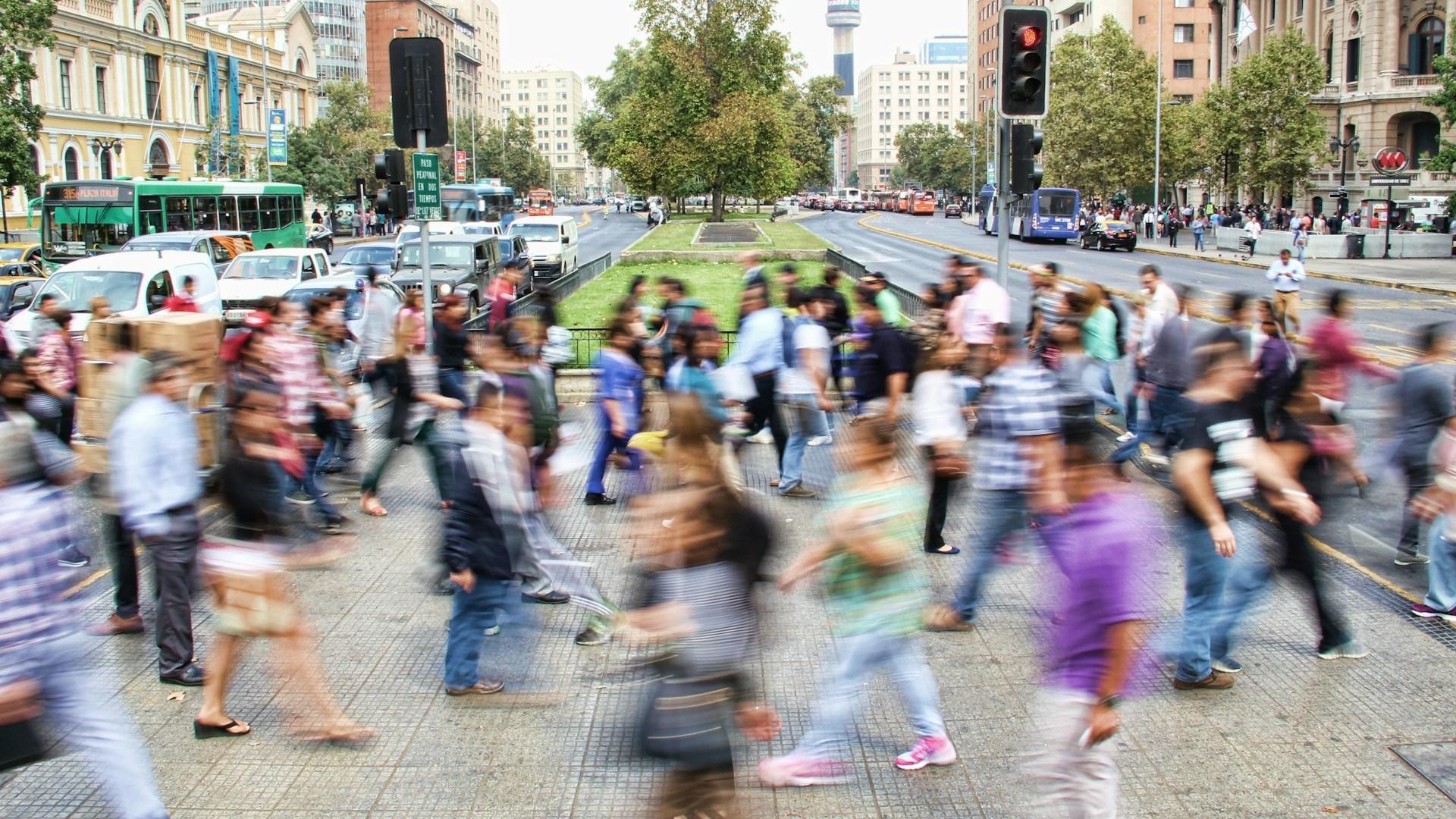 People crossing a street; illustrative archive photograph.