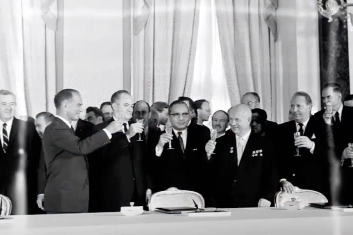 An archival photograph of officials at a treaty event