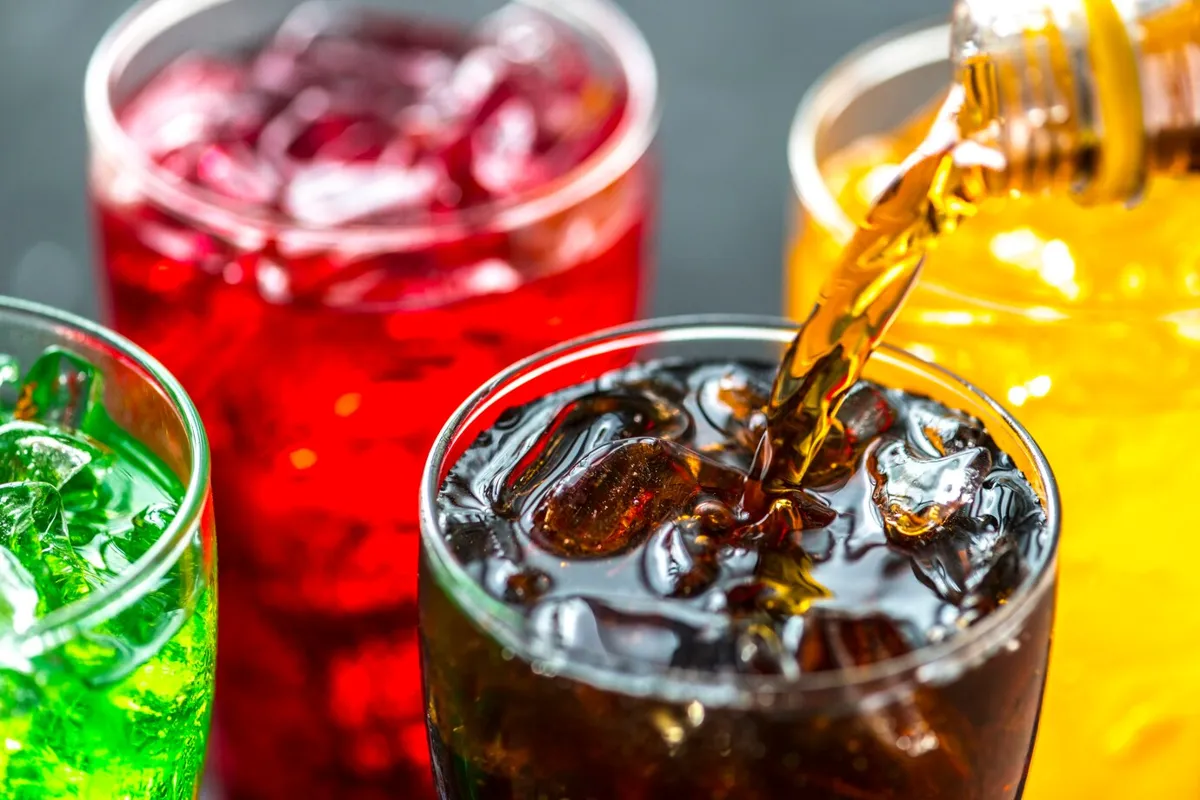 Colorful soda drinks in glasses