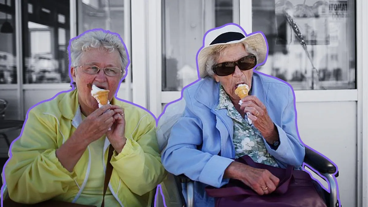 Elderly holidaymakers enjoy a traditional ice cream cone on the South Beach in Lowestoft, England