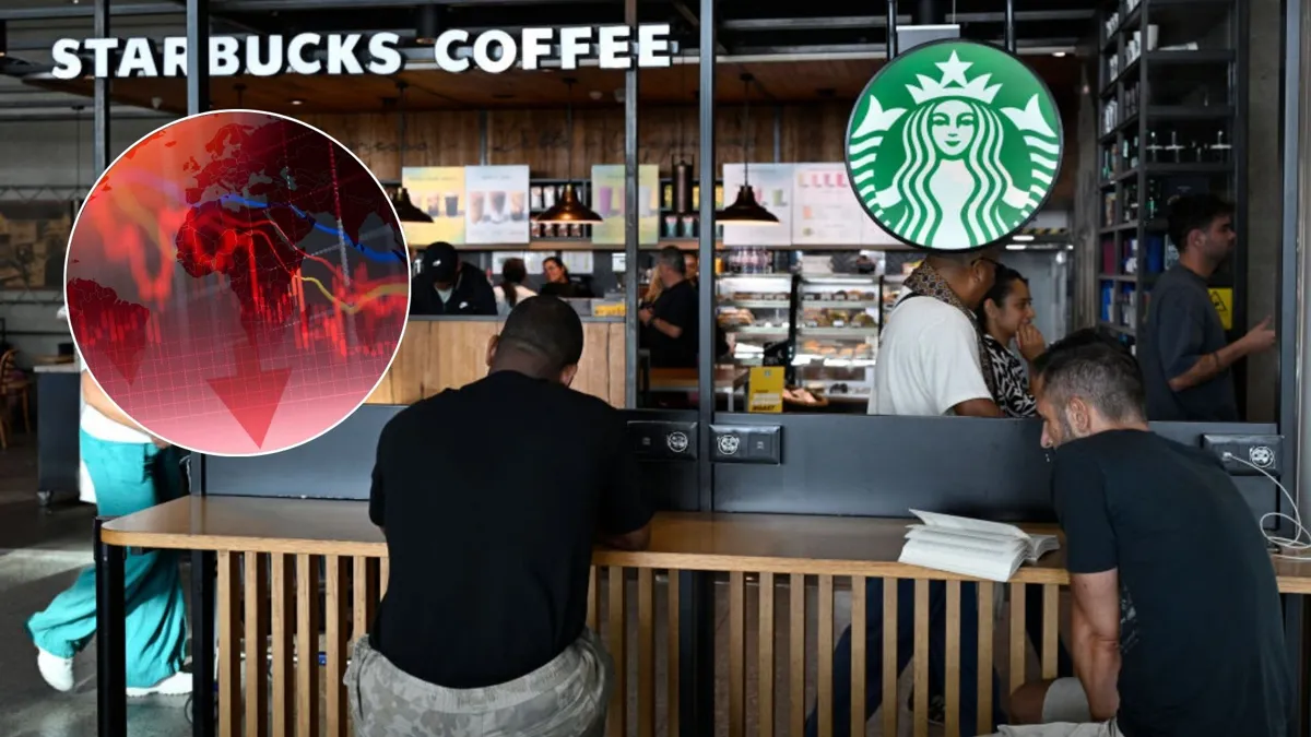 The interior of a busy Starbucks with several customers sitting and standing