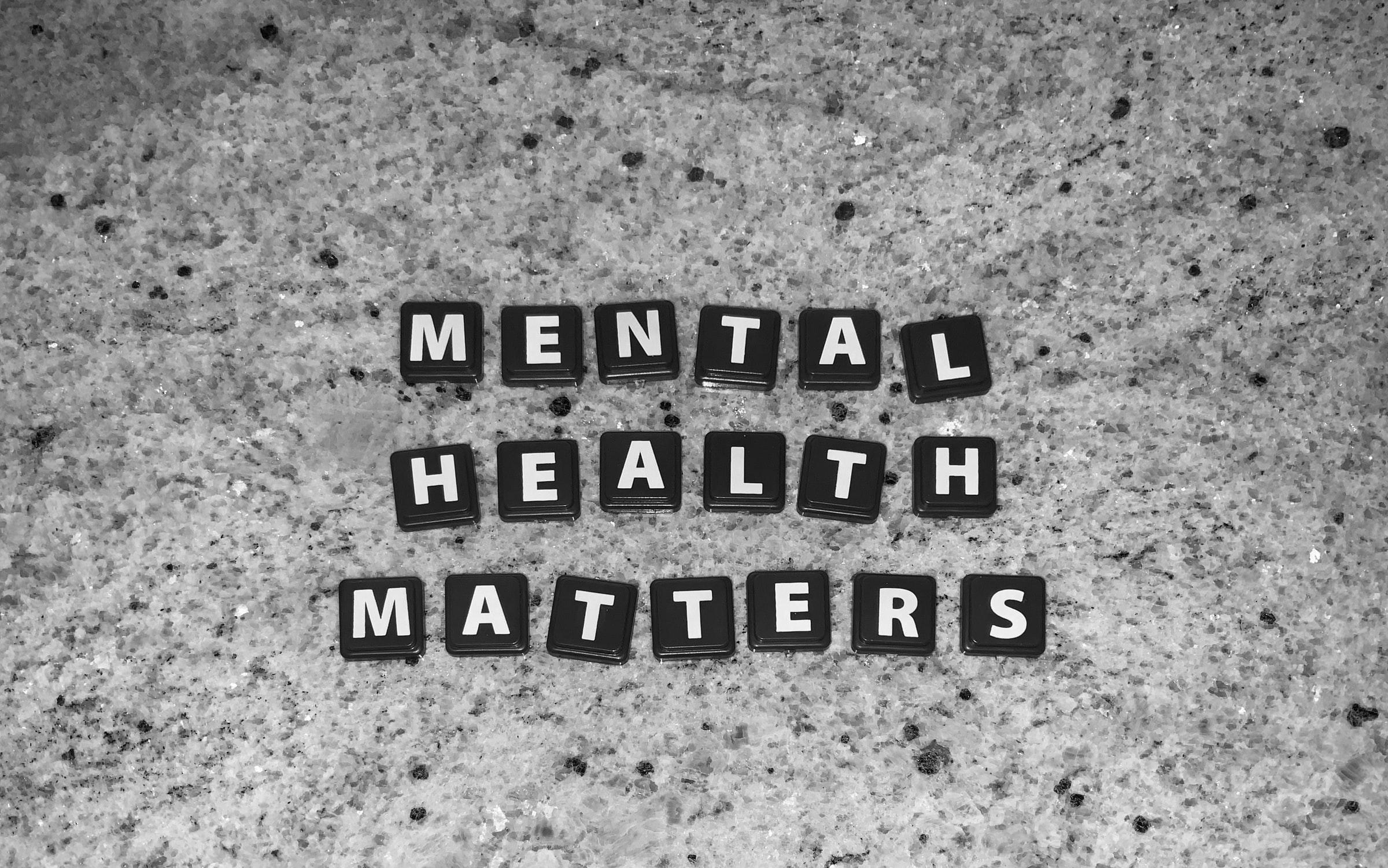 Letter tiles spelling Mental Health Matters