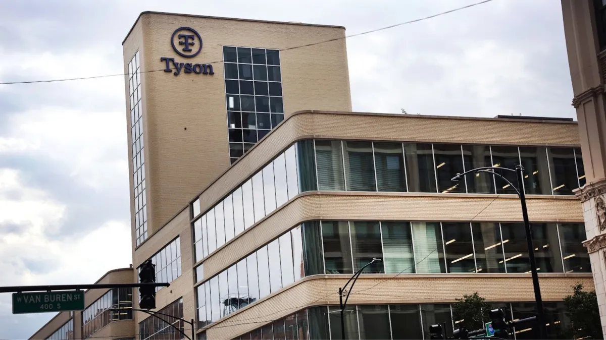 One of the Tyson Foods Offices. The Tyson Foods logo is at the top of the building.