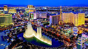 Las Vegas hotels and fountains at night; archive photograph.