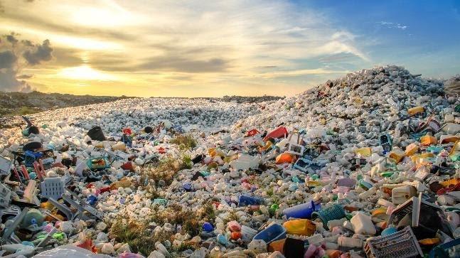 Waste across an outdoor landscape; illustrative archive photograph.
