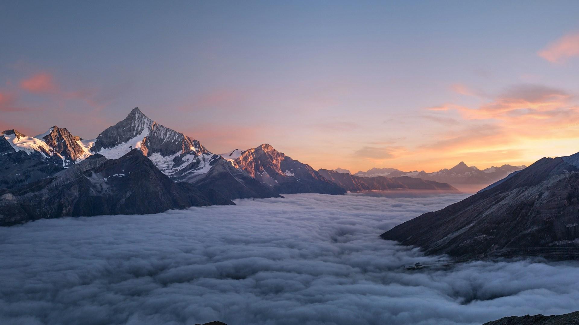 Mountains at sunrise; illustrative archive landscape.