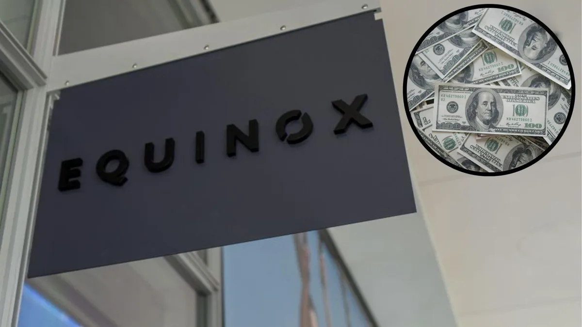 A sign for an Equinox gym hangs outside with a small circle of $100 bills in the corner