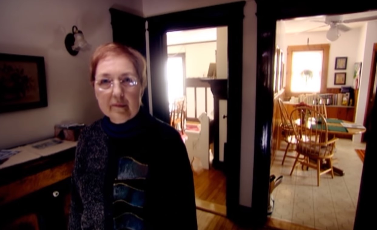 A woman seated for an archived interview