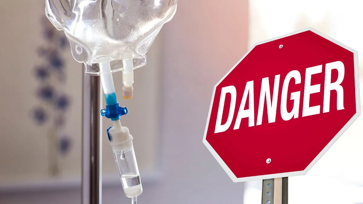 A photograph of a morphine drip/A red stop sign that reads “Danger”