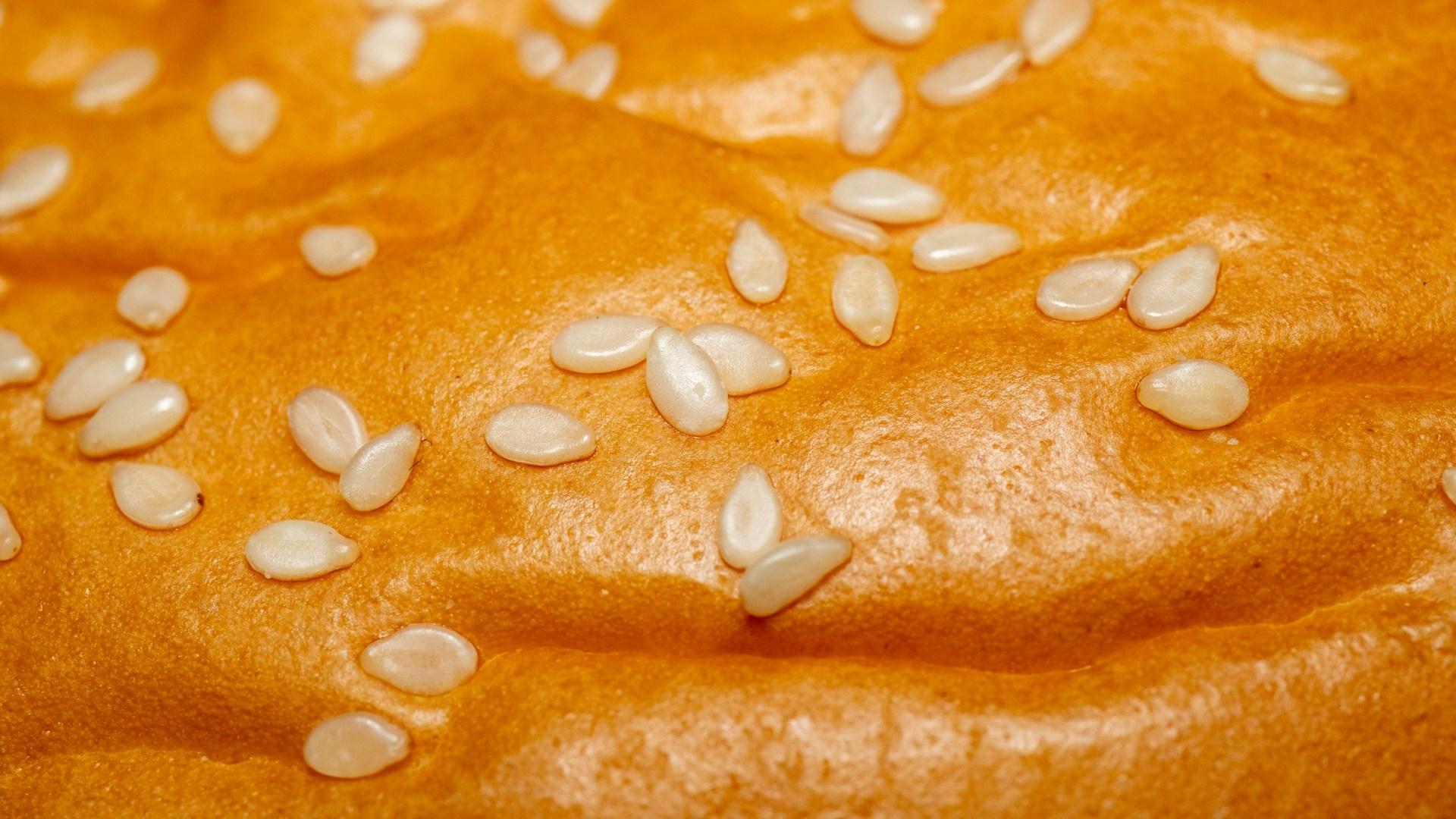 Sesame seeds on bread; illustrative archive photograph.