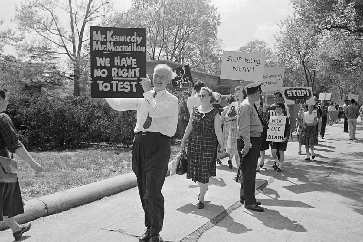 An archival march with signs opposing nuclear tests
