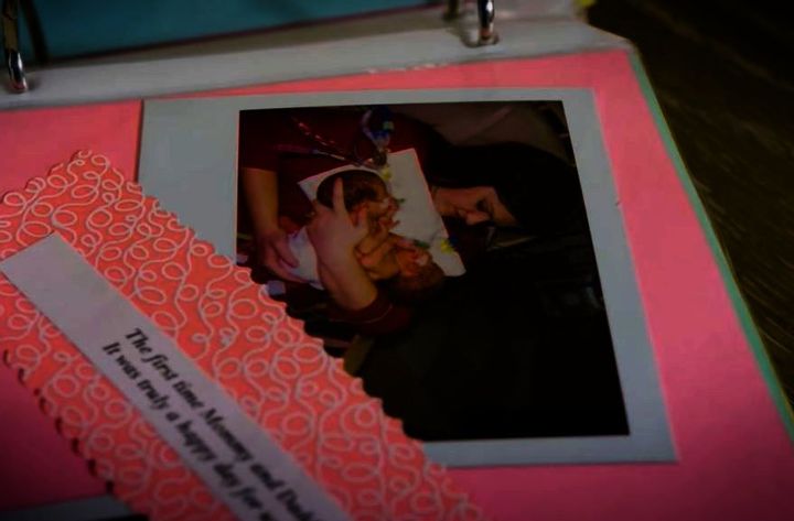 A handmade card with a photograph of the twins