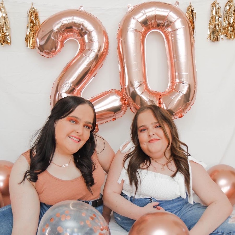The sisters beside balloons marking their twentieth birthday