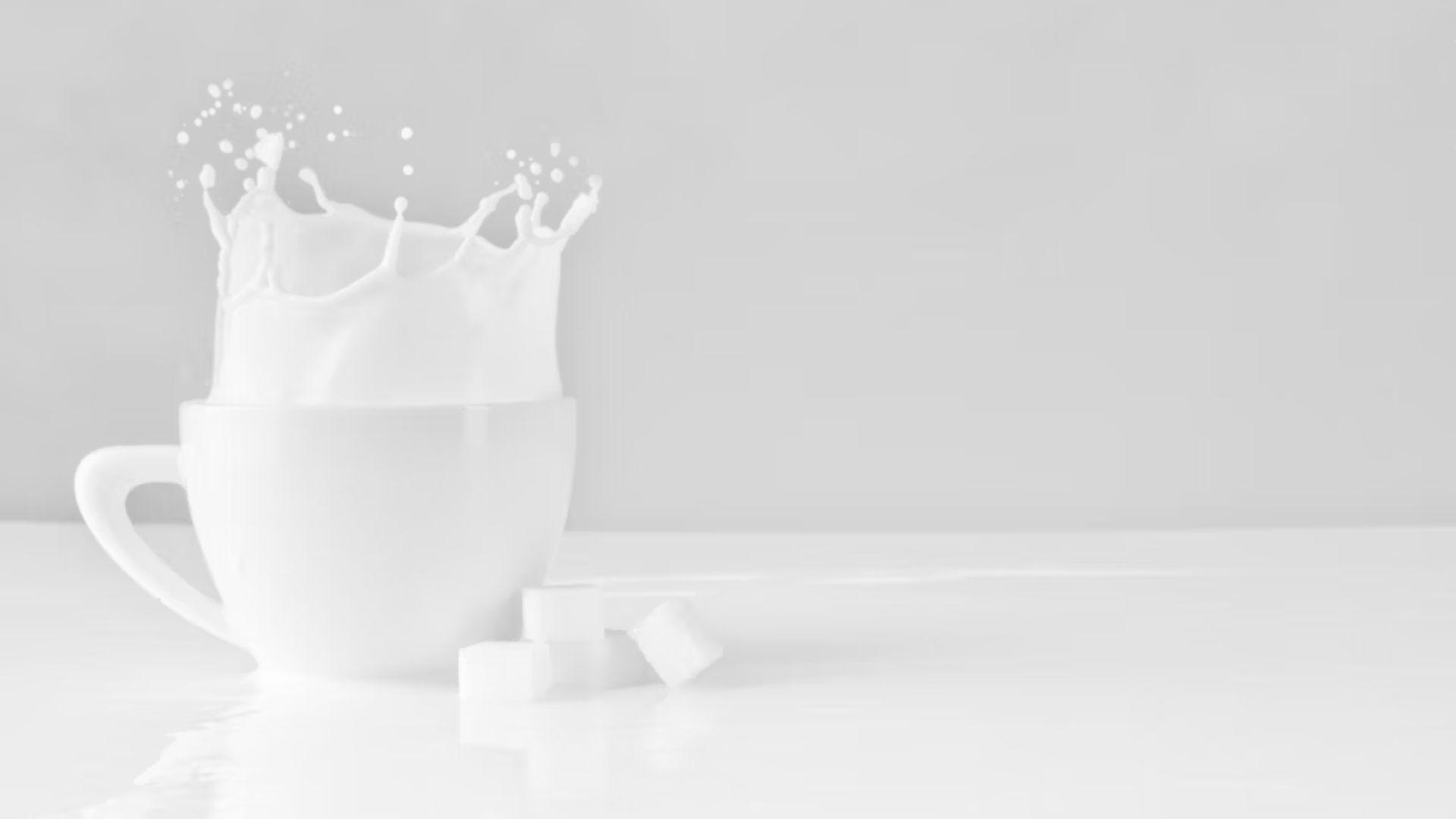 Milk pouring into a glass; illustrative archive allergen photograph.
