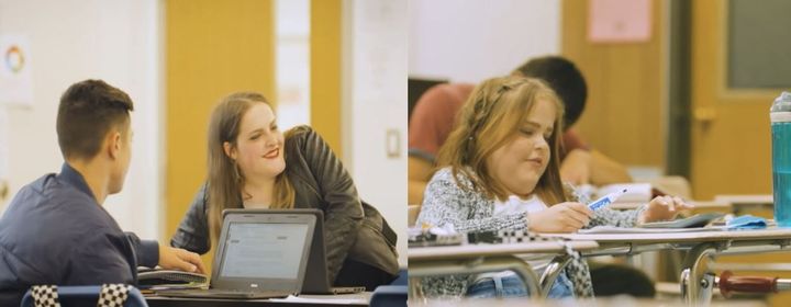 The sisters studying at desks in a classroom