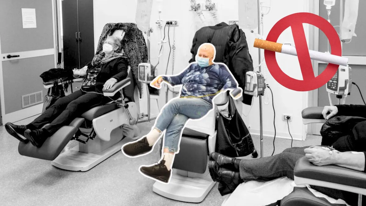 Two women sit in chairs receiving chemo therapy in a hospital setting with a large no smoking sign imposed on the photo