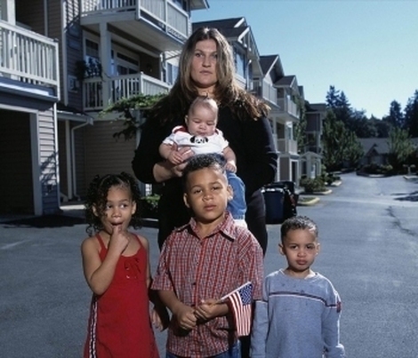 An archived family photograph outside a home