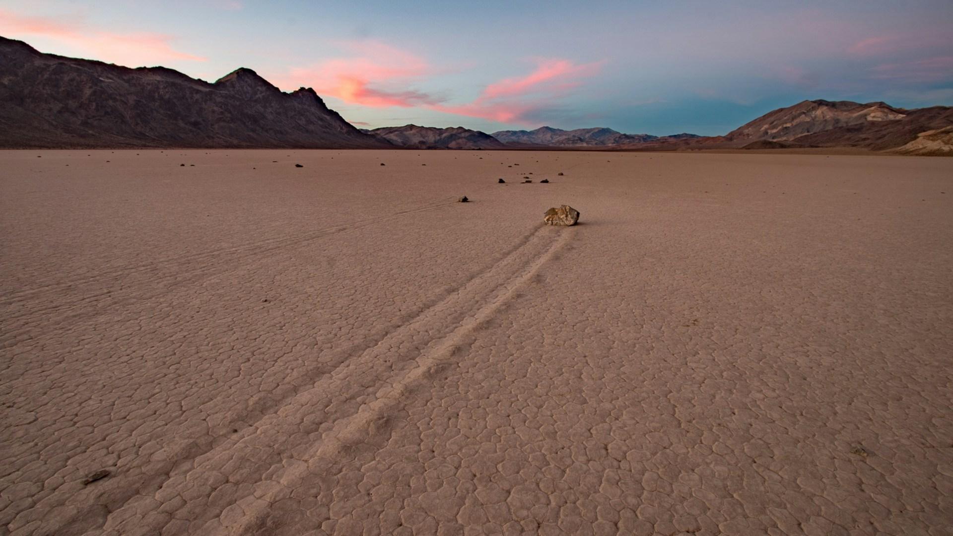 A desert playa with tracks; illustrative archive landscape.