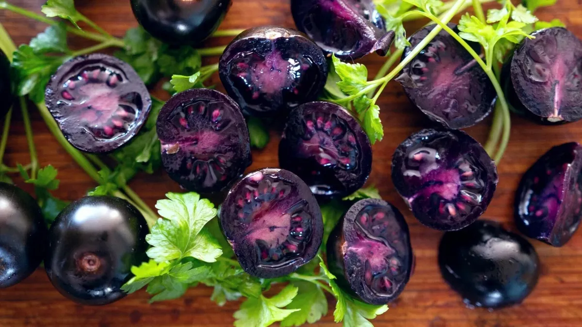Purple tomatoes sliced in half